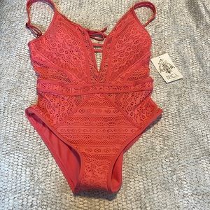NWT Becca Virtue pink play one piece size small